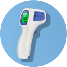 White Infrared Thermometer on light blue background